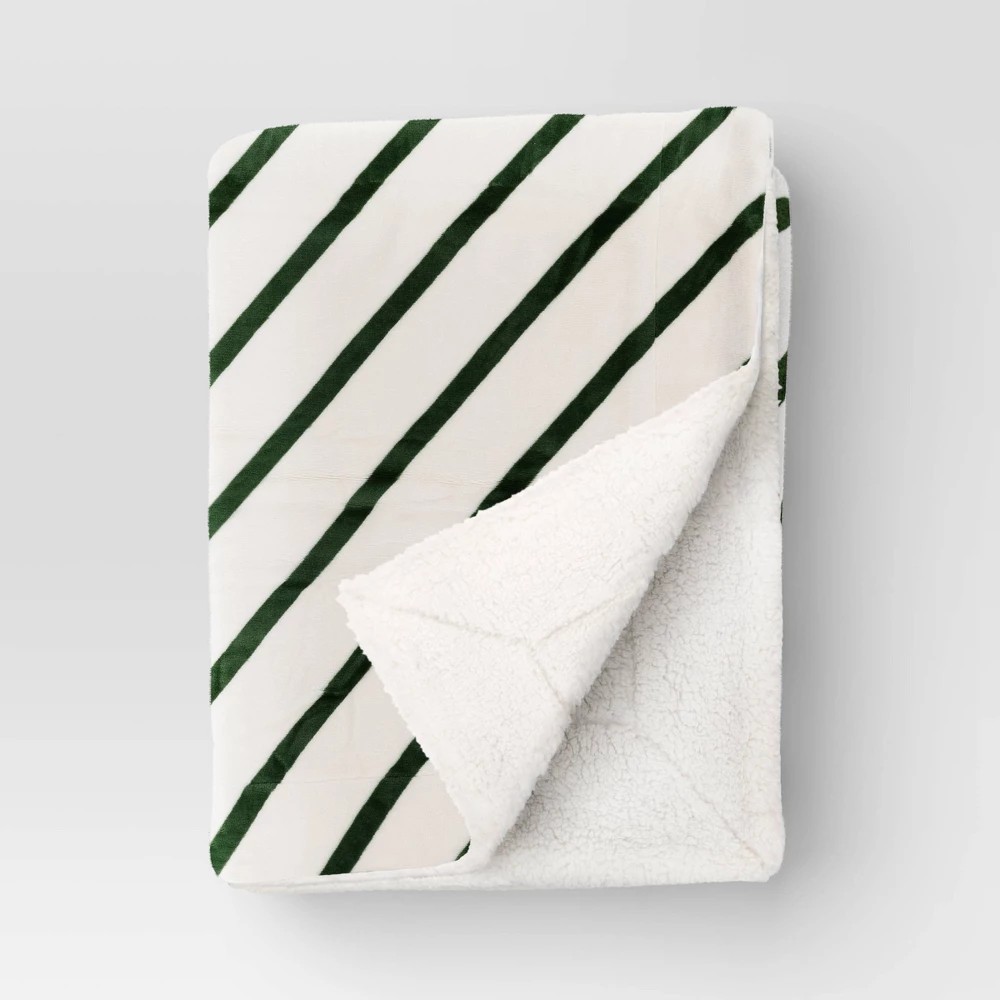 Photo 1 of Candy Cane Striped Printed Plush Throw Blanket with Faux Shearling Reverse Ivory/Green - Threshold™