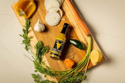 The GOAT Hot Sauce, 5 Fl Oz, Mild Heat with a Hint of Sweetness, Made from Fresh Ingredients: Habanero Peppers, Onions, Carrots, Jalapenos and Garlic. thumbnail