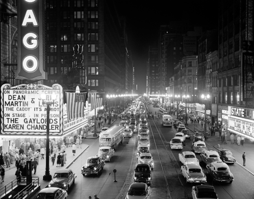 1950s-1953 Night Scene of Chicago State Street with Traffic and Movie Marquee with Pedestrians on the Sidewalks Stretched Canvas - Vintage Images ()