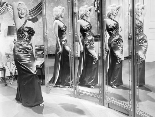 Marilyn Monroe (1926-1962) Namerican Cinema Actress in a Scene from How to Marry a Millionaire 1953 Stretched Canvas - (24 X 36)