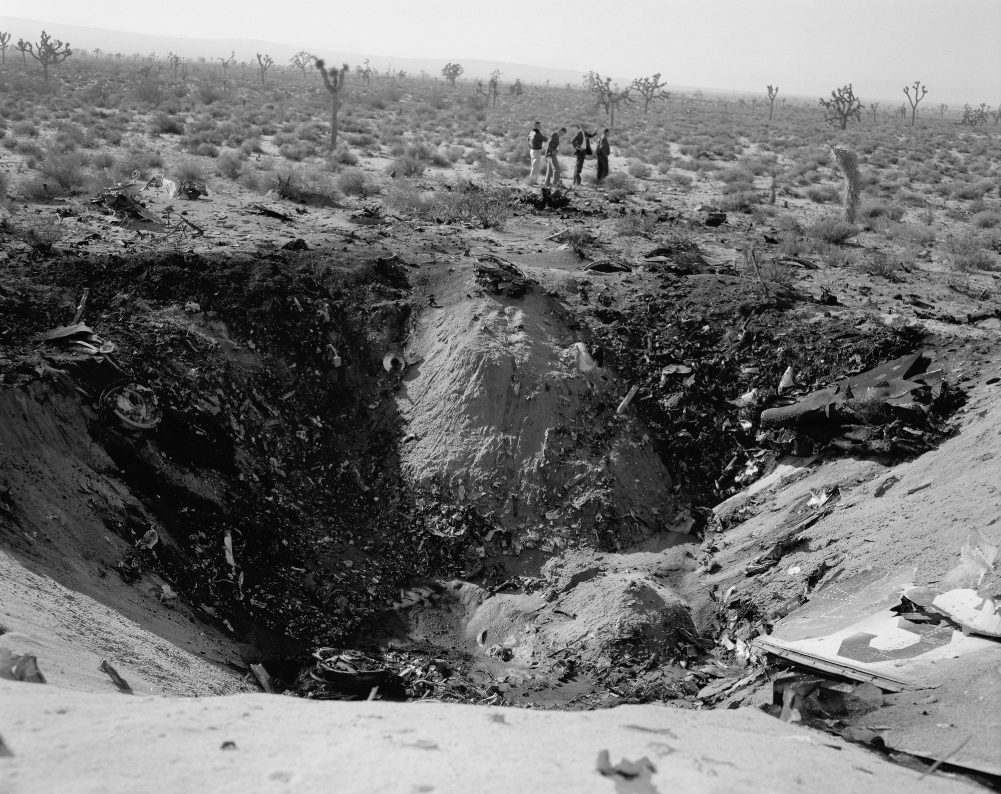 LAMINATED POSTER E62-9303 Investigators Pore Over the Site of the Nose-first  High-impact JF-104A Crash That Left Thi Poster Print 20 X 30