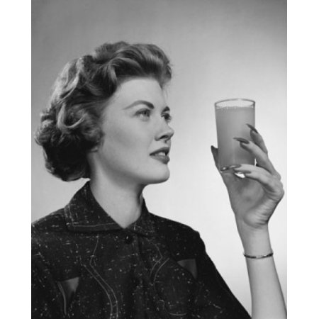 Close-up of a Young Woman Holding a Glass of Juice Canvas Art - (18 X 24)