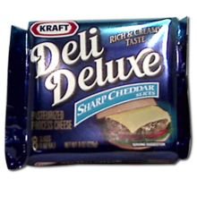Kraft Deli Deluxe Sharp Cheddar Sliced Cheese, 8 Ounce -- 12 per Case.