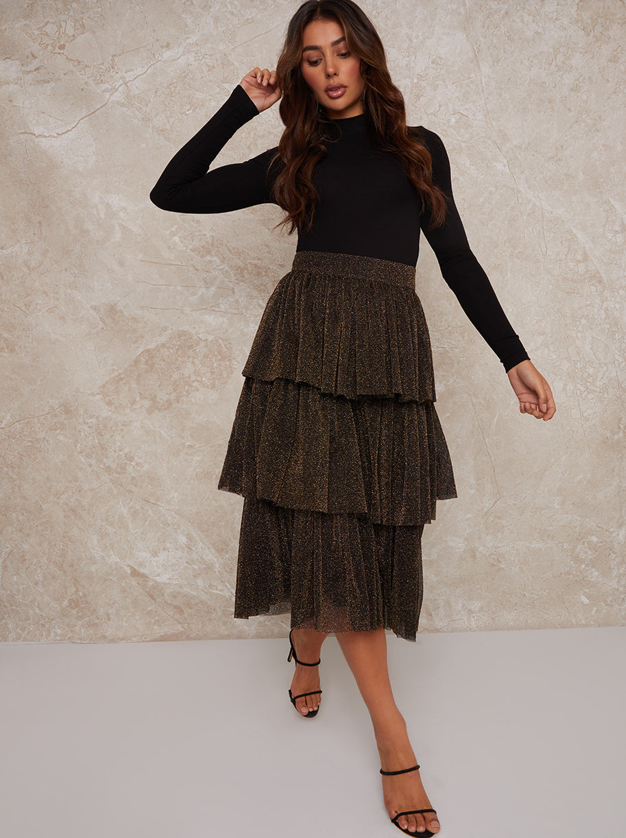 Chi Chi Ruffle Tiered Dip Hem Maxi Skirt in Gold in Black, Size 16