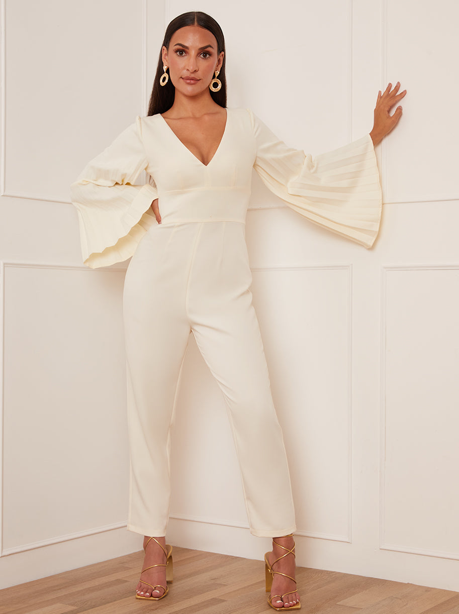 Chi Chi Petite Long Bell Sleeve Pleated Jumpsuit in Cream in Neutrals, Size 16