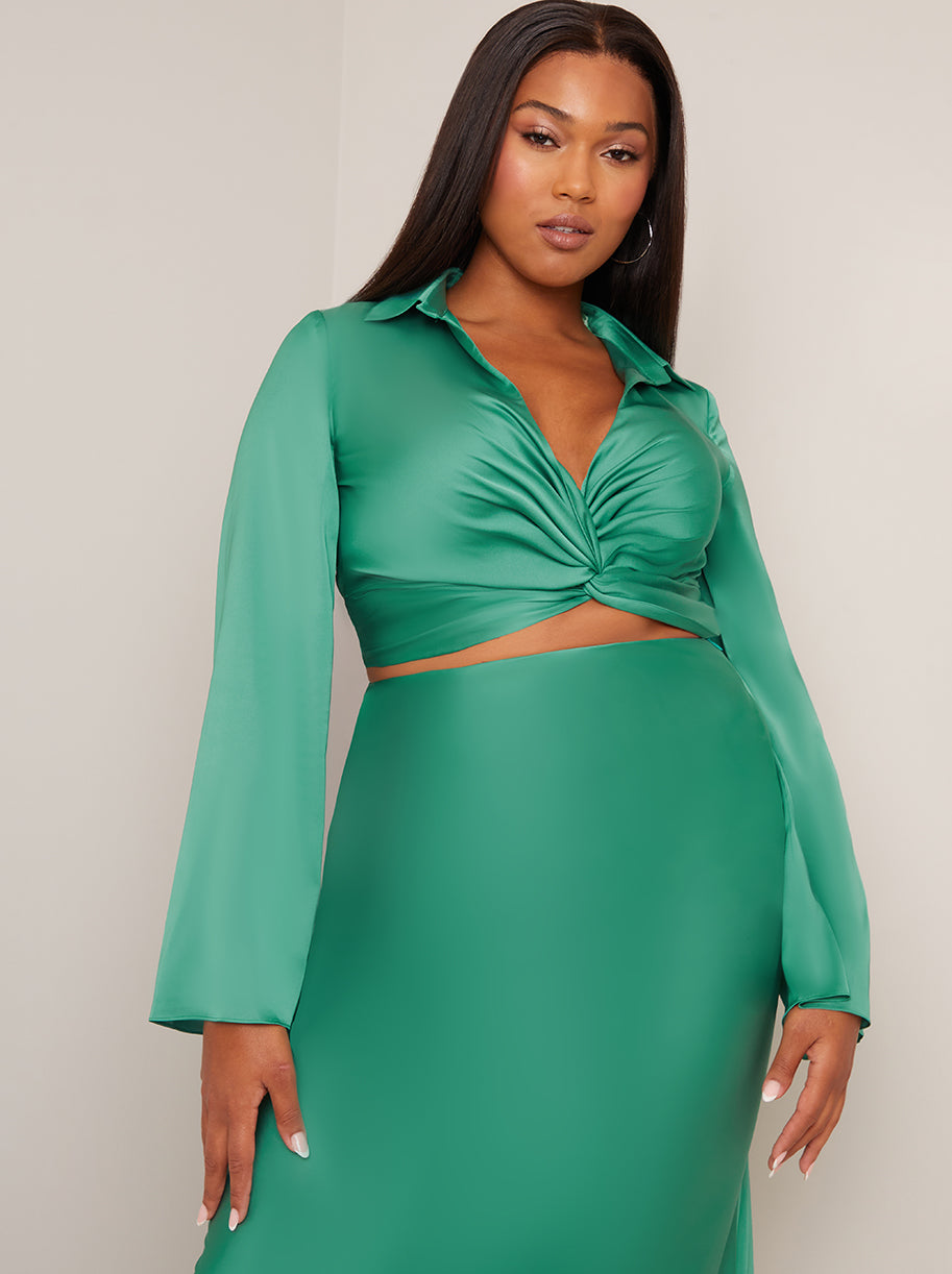 Chi Chi Long Sleeve V Neck Satin Twist Detail Top in Green, Size 16