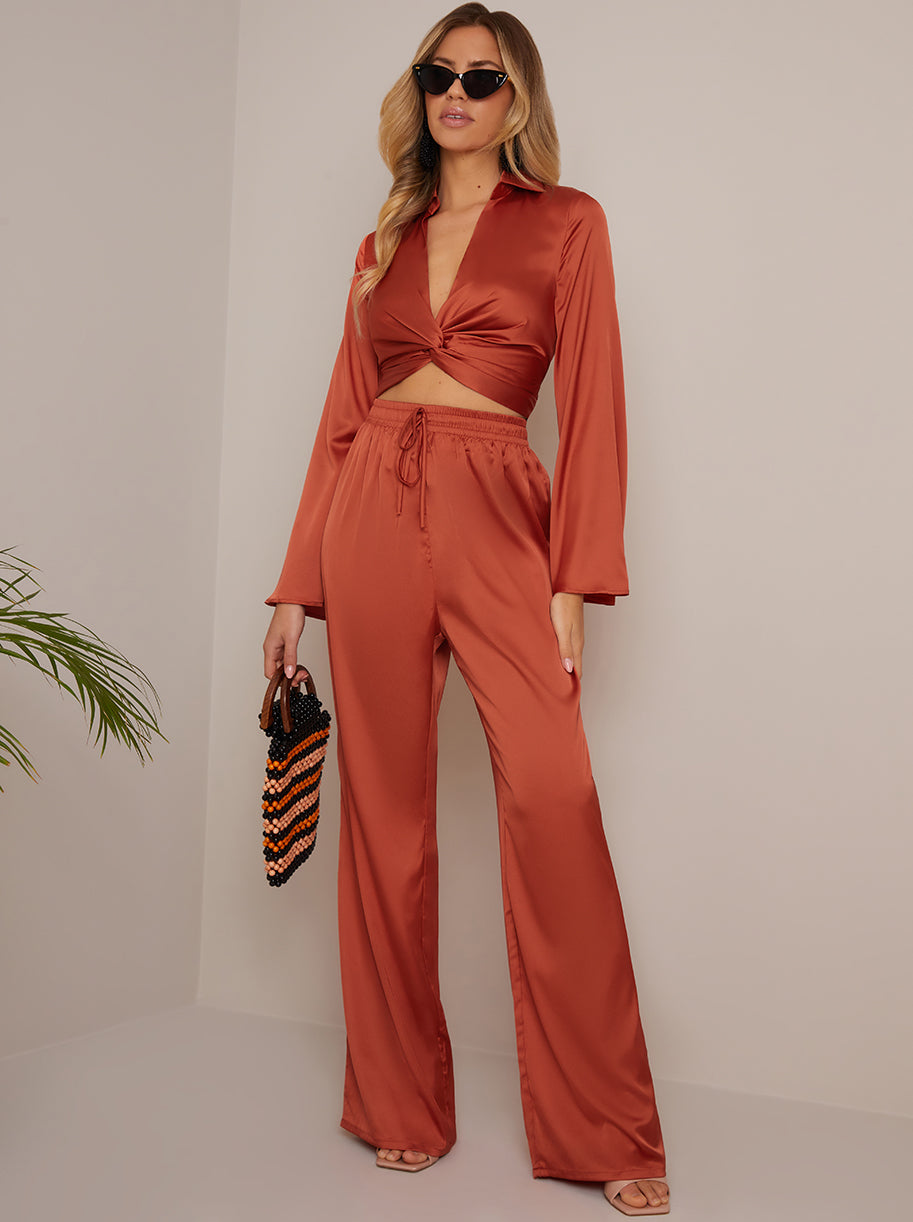 Chi Chi Long Sleeve V Neck Satin Twist Detail Top in Burnt Orange in Rust, Size 16 thumbnail